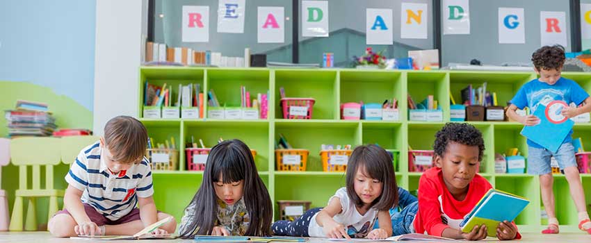 Young children reading books