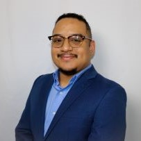 Erick in a suit