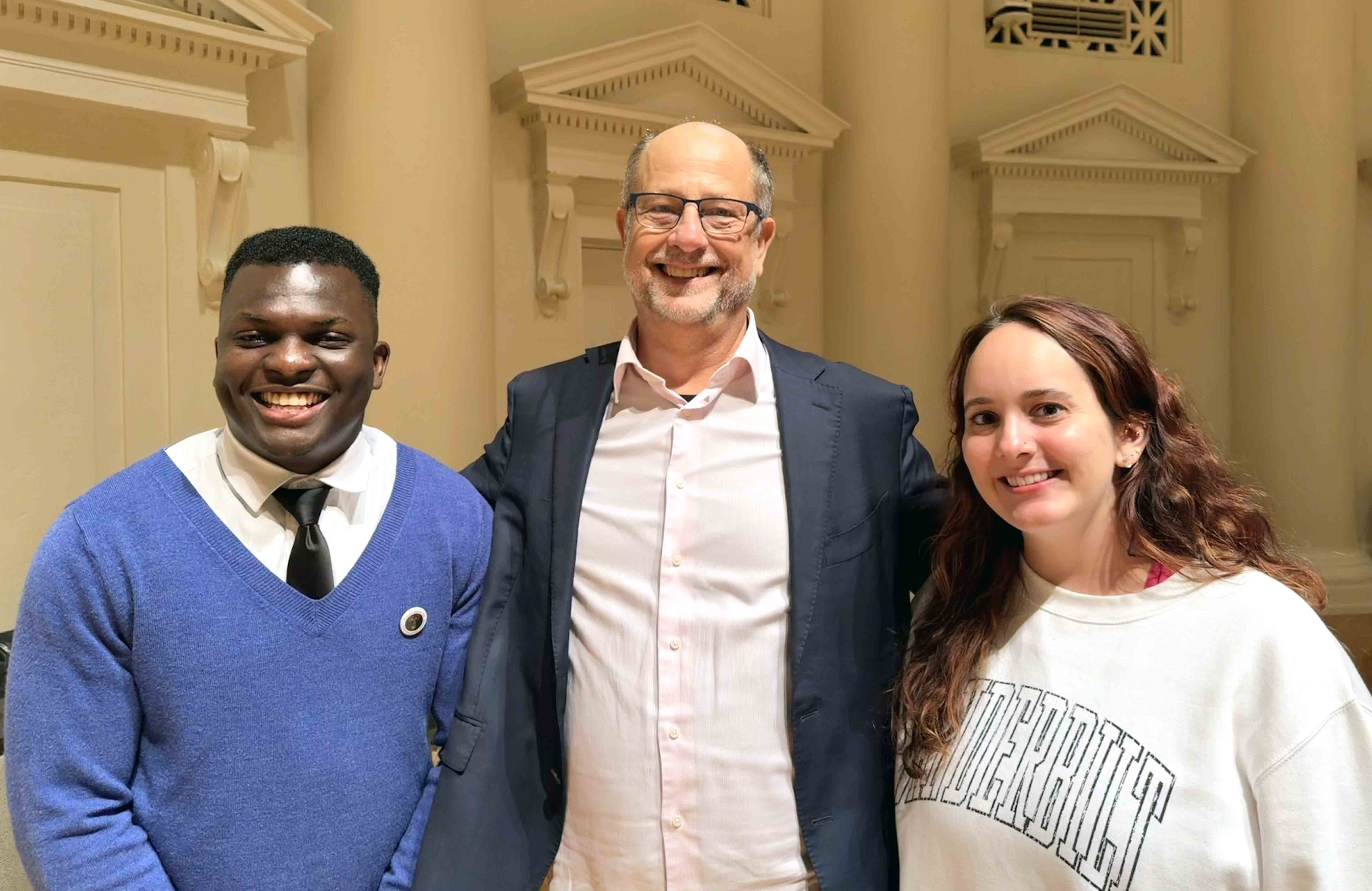 Graduate students with researcher